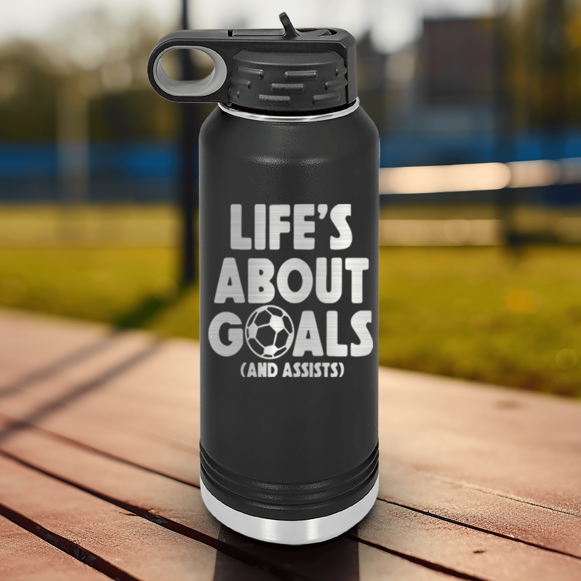 Black Soccer Water Bottle With Celebrating Scores And Teamwork Design