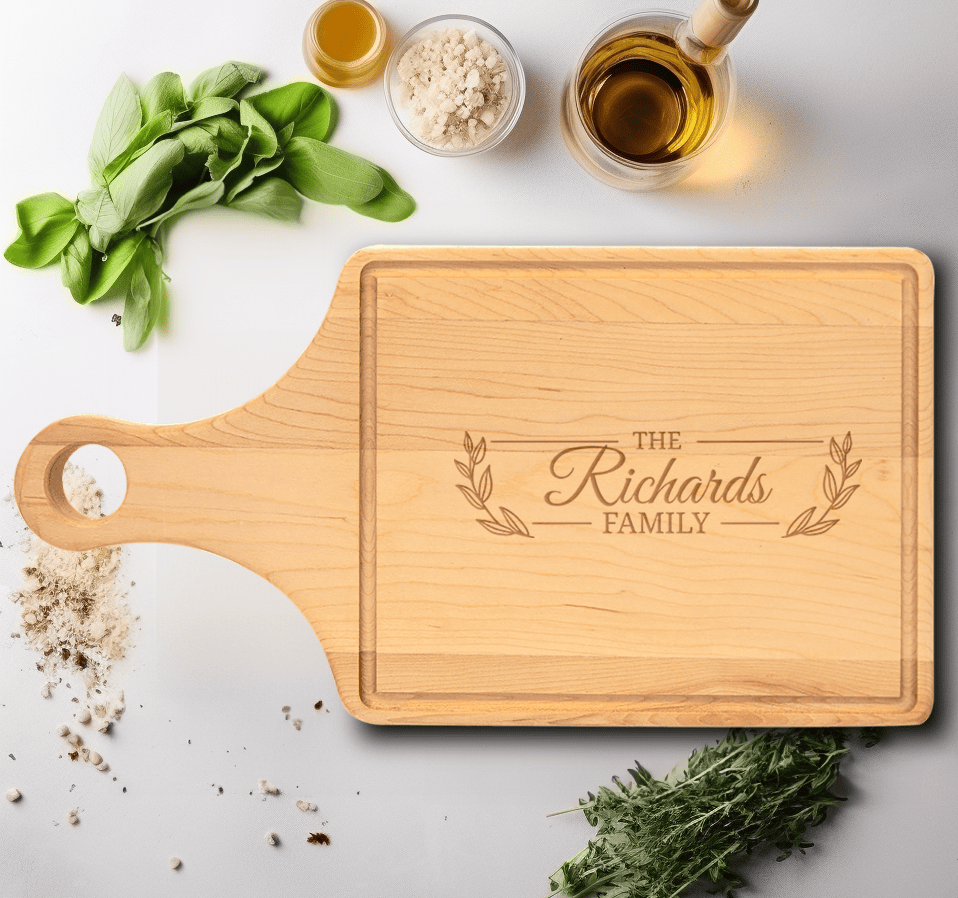 Family Name Maple Paddle Cutting Board With Family Noble Knot Design