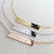 Personalized bar necklaces in gold, silver, and rose gold with custom engraved names or coordinates