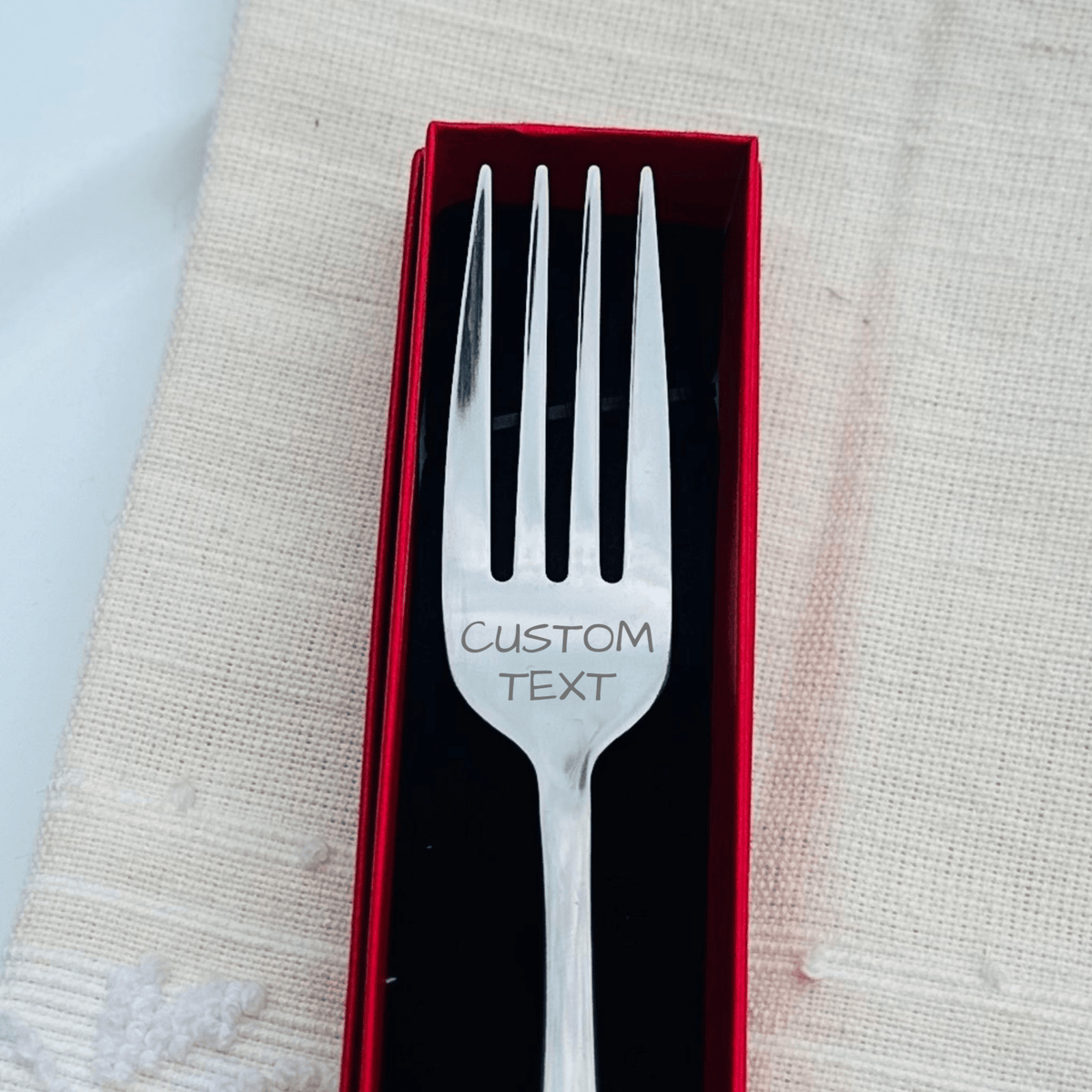 Quirky Custom Engraved Fork in red gift box with personalized message on stainless steel handle