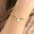 Elegant dainty stacking bracelet with sparkling CZ crystal in gold finish